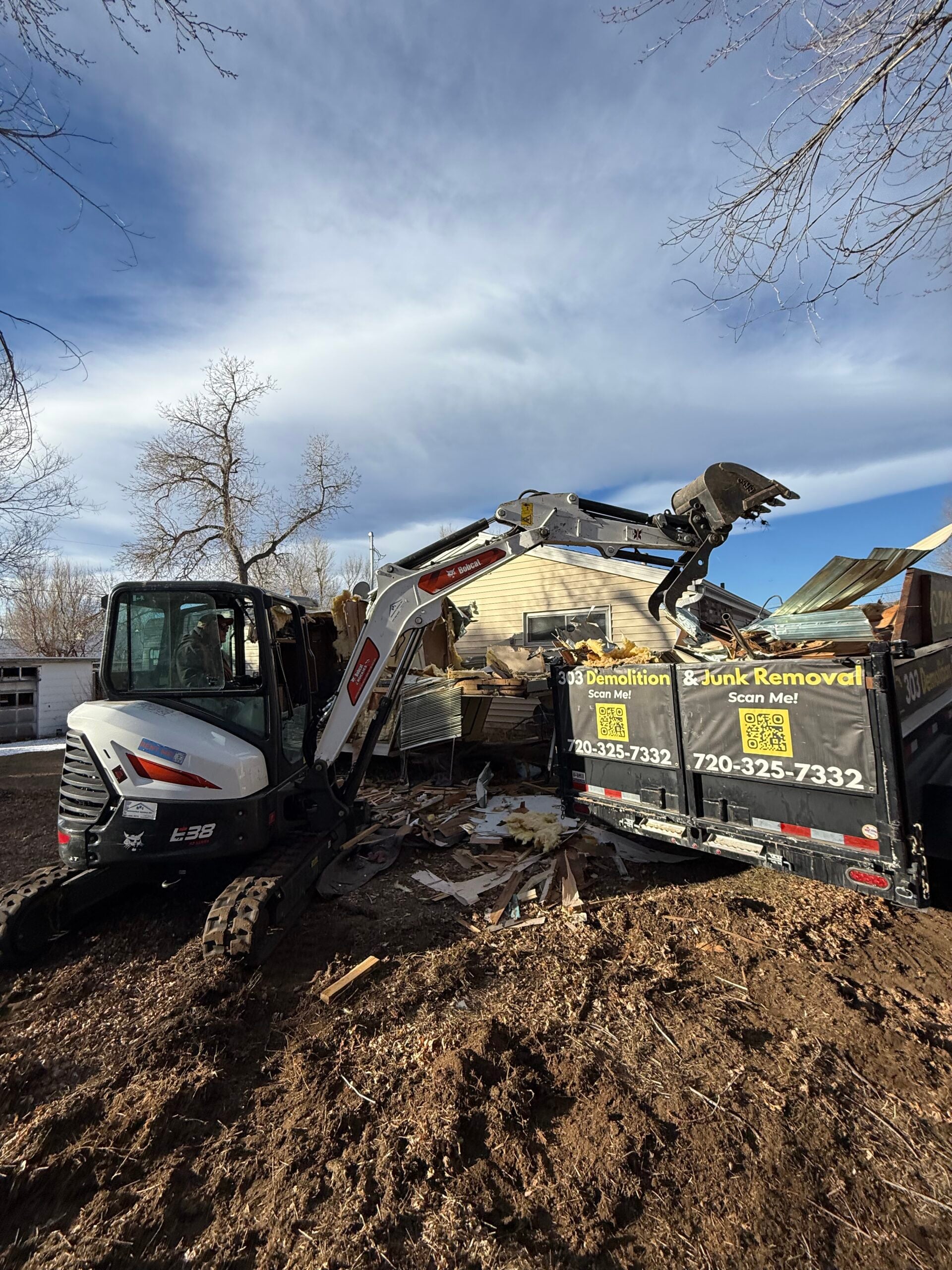 303 Demolition crew on a Boulder County job site